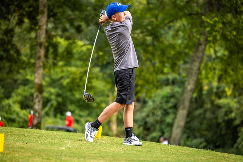 Students play golf